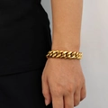 Men's hip hop Miami Cuban link bracelet in gold-plated stainless steel on male model wrist - Gold (Width 16mm) / Bracelet 7 Inches (17.78cm In Length)