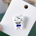 Cartoon tooth brooch with blue bow on card, minimalist enamel pin for shirt decor - Cartoon Tooth/Blue Bow
