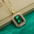 Golden necklace with a green rectangular gemstone pendant surrounded by crystal zircons - Gold Green
