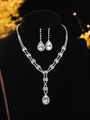 Silver bridal jewelry set featuring crystal necklace and drop earrings on a black bust - DTN14027339W-Silver Clear Teardrop Main Stone