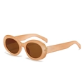 Retro oval sunglasses with light orange translucent frames and brown lenses - Jelly Tea