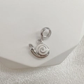 Macro view of a silver snail charm with white enamel and spiral detail for bracelets - Style B (Snail)