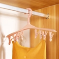 Rosa Kunststoff-Kleiderbügel mit mehreren Clips zum Trocknen im Holz-Kleiderschrank - 8 Clips Nordic Rosa
