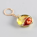 Miniature hot pot keychain featuring a split soup base with a shrimp and golden chain - Shrimp Hot Pot / Gold Key Ring Style