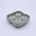 Light green silicone ice ball mold for 4 spheres, high quality 45 degree angle view - 4-Sphere Morandi Green