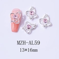 Detailed view of silver heart planet nail art charms with pink gems on a long nail - Silver Heart Pink Rhinestone (AL59)