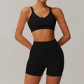 Two-piece black seamless yoga set with thin strap sports bra and high-waist biker shorts - Premium Black (Bra + Tight Shorts)