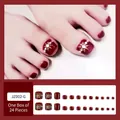 Deep red press-on toenails with golden radiant patterns and pearl accents, model JZ002-G - JZ002-G Pearly Cherry with Diamonds