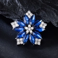 Elegant silver flower brooch with deep blue marquise rhinestones on black stone background - XD825137-1 Silver Dark Blue