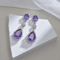 Silver drop earrings with purple pear-shaped zirconia stones and sparkling pave details - Purple