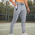 Pantalón deportivo ajustado gris claro para hombre con bolsillos de cremallera - S / Gris