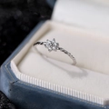 Vintage S925 sterling silver twist ring with micro-set zircon flower in a bright silver finish - Adjustable Open / White Gold