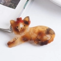 Cute orange marble pattern cat hair clip with red bow detail on white background - Orange Marble Cat / Orange Brown