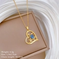 Detailansicht der goldene Herz-Halskette mit Meeresschildkröten und blauen Muscheleinlagen - Edelstahlkette Kupfer Mikro Eingelegter Schildkröten-Herz-Stil (E448) / Gold