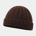 Close-up of cable knit texture and ribbed cuff on a dark brown winter beanie hat - One Size / Coffee