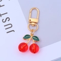 Detail of red cherry keychain with gold spring hook and green enamel leaves - Style B-Translucent Red Cherry