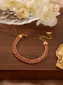 Detail of 18K gold snake chain bracelet with pink crystals and adjustable clasp on wood - 16.5-23cm / Gold & Pink Zirconia