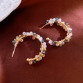 Detail of handmade beaded hoop earrings with gold wire on luxury red satin fabric background - Multicolored Crystal Hoop (S925 Silver Needle)