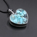 Heart pendant necklace featuring turquoise blue stones and black braided cord - Blue Turquoise (Synthetic)