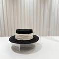 Detail of black boater hat featuring pearl-embellished cream ribbon and fine woven texture - M (56-58cm) / Black (Pearl Ribbon with Label)