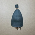 Dark gray leather key case with metal ring and secure brown cord on beige background - Solid Military Green