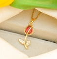 Golden tulip necklace with red teardrop stone and zircon leaves in a jewelry box - Red Tulip / Gold