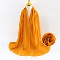 Orange pearl chiffon scarf with soft fabric texture and professional draped finish - Orange