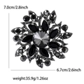 Vintage style black rhinestone flower brooch on white background with size dimensions - Gun Black