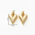 Detalle de dijes de corazón bañados en oro 18K, 15,3 mm de alto, con acabado de espejo - 1 pieza