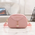Pink quilted shell crossbody bag with pearl pendant and adjustable strap for women - Pink