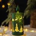 Green frosted LED Christmas candle with gold reindeer and Santa patterns in warm light - Long Candle Shape / Green