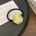 Punk style hair tie featuring a golden textured alloy metal disc with a black elastic cord - 4# Gold Round Wrinkle