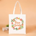 White canvas tote bag with floral wreath and Team Bride print for bachelorette party - Style U (Team Bride/Orange/Art Wreath)