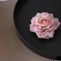Elegant large pink fabric rose flower hair clip and brooch displayed on a black plate - Gejiao Rose / Pink White