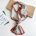 Elegant ivory skinny scarf with black letter print and orange border detail - D-Pattern Framed Orange Red