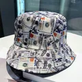 Double-sided bucket hat featuring a bold 100 dollar bill money print on canvas fabric - Dollar (Slide Pattern)
