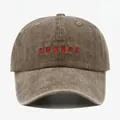 Washed dark brown baseball cap featuring red embroidered CHANCE text in vintage style - Adjustable / Khaki
