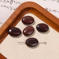 Oval reddish-brown natural stone beads for DIY jewelry making on a wooden tray - Reddish Brown Natural Oval Stone Style (57号)