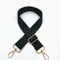 Detail of green and black geometric diamond woven strap with gold metal hooks - Black Base Dark Green