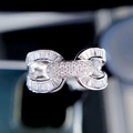 Elegant U-shaped interlocking silver ring with pavé zircons and baguette-cut stones - US 7 / White Gold