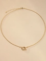 Detailed close-up of 18K gold-plated necklace chain and round spring clasp fastener - O Chain / Gold