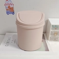 Cute pink desktop mini trash can with press-top lid on a magazine for office storage - Pink / Single Item