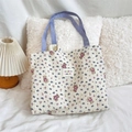 Detail of floral bear print canvas tote with purple straps and wrinkled texture fabric - Purple Flower Toy Bear