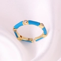 Makroaufnahme Goldener Bambusring mit blauer Emaille und funkelnden Zirkoniasteinen - Einstellbar Offen / Blau