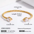 Detail of 18K gold stainless steel twisted bracelet with teardrop zircon stones - Twisted Spiral Pear-Cut Zircon Bangle