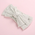 Soft jacquard bow headband for baby girls made of breathable and stretchy nylon - Off-White