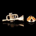 Golden trumpet music brooch pin with butterfly clutch on reflective black background - Gold Trumpet