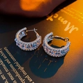 Detailed macro view of silver hoop earrings with double-row sparkling zircon stones - Stainless Steel Post - Silver