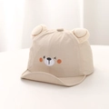 Detailed embroidery of a cute bear face on a cream baby sun hat with plush ears - 50cm 1-3 Years / Light Khaki Bear