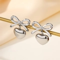 Silver stainless steel bow earrings with heart pendants on a professional display - Silver Bowknot Heart Style (E01189S)